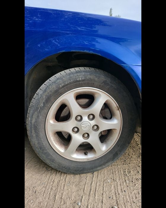 Mazda 323 (Торг)