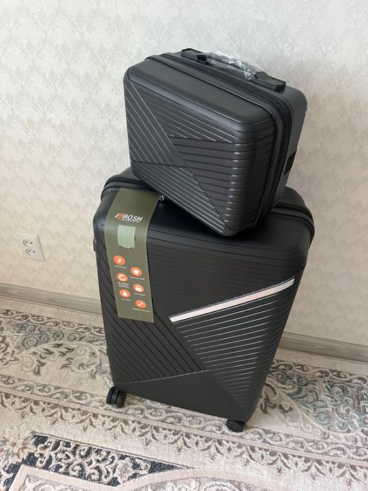 Продам новый чемодан