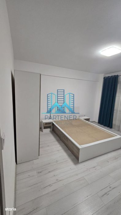 Apartament 1 camera + loc de parcare mobilat+utilat Bucium-Visan,liber