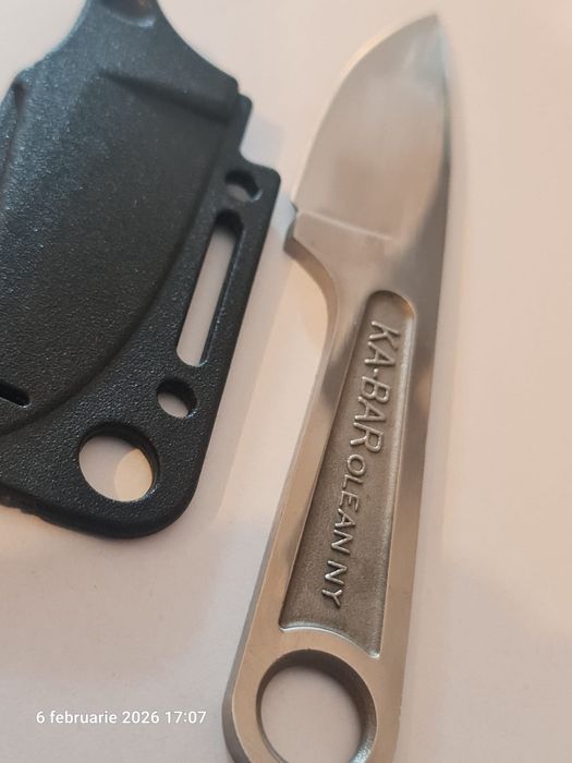 Două cuțite  inox.