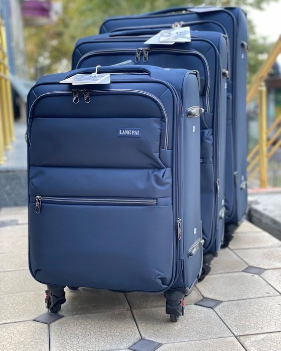 Чемоданы фирменные новые