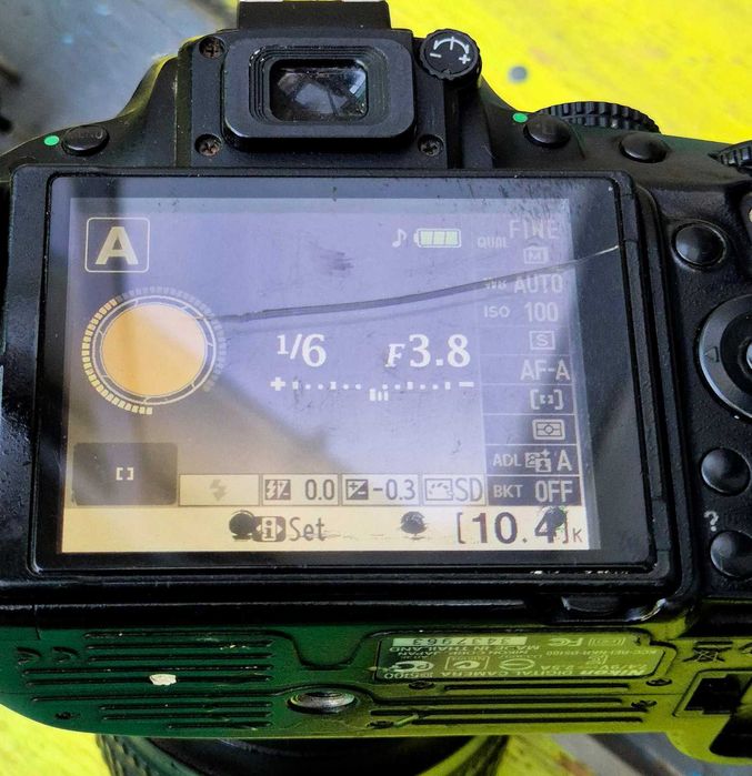 Nikon D5100 + Обектив 18-105mm VR  – Работещ, със сериозни козметични забележки (За ползване или части)
