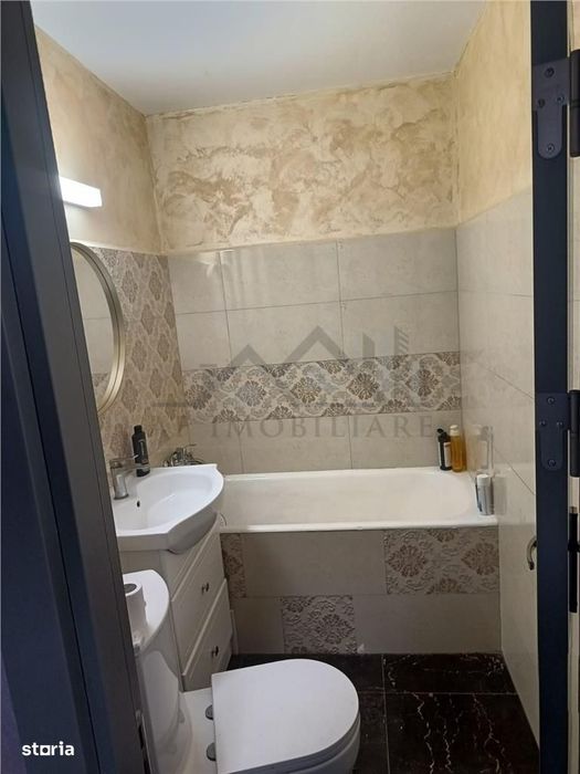 Apartament 2 camere etajul 1 zona Podu Ros