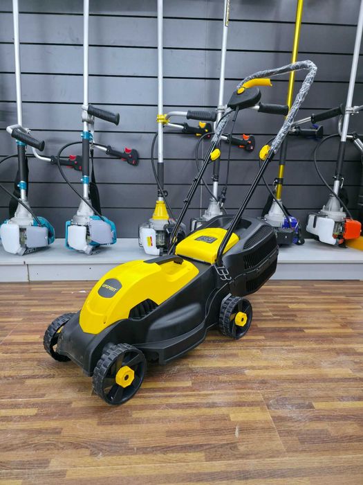 Газонокосилка бинзин и электр газон у'ргич