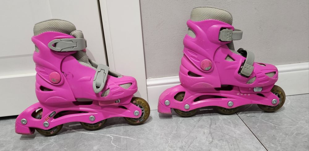 Роликовые коньки.