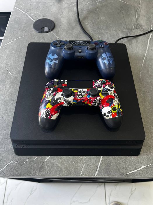 PlayStation 4 Slim 1Tb
2 джойстика
Записано 14 игр
Состояние отличное