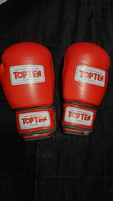 Продам перчатки боксерные