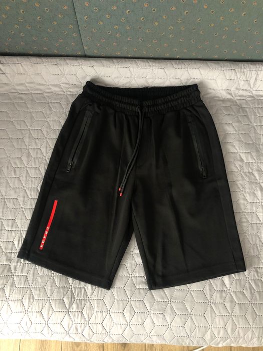 Pantaloni surti Prada