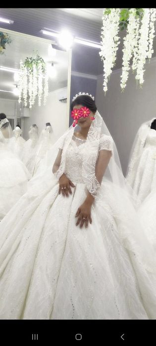 Продаю свадебные платье по цене проката