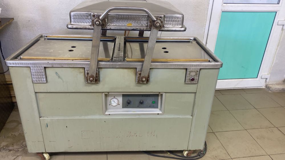 Вакуумный упаковщик