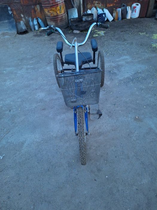 Велосипед трех колесный