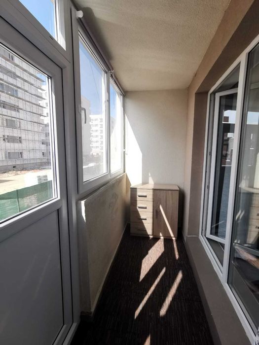 Apartament doua camere cu loc de parcare si curte proprii