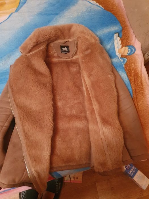 Женская дубленка