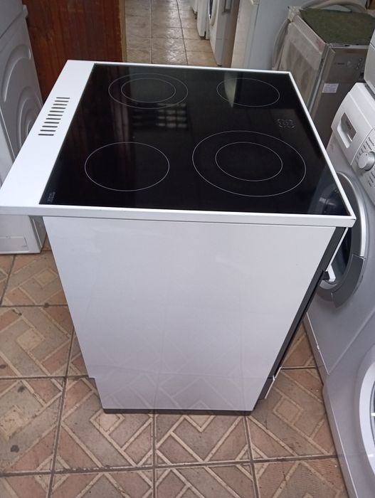 Свободно стояща печка с керамичен плот Gram 2 години гаранция!