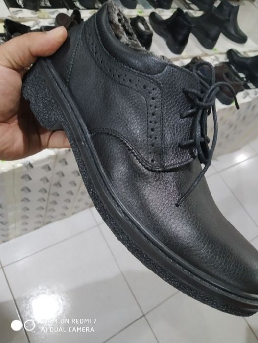 Мужские сапоги утеплённые с мехом из натуральной кожи.