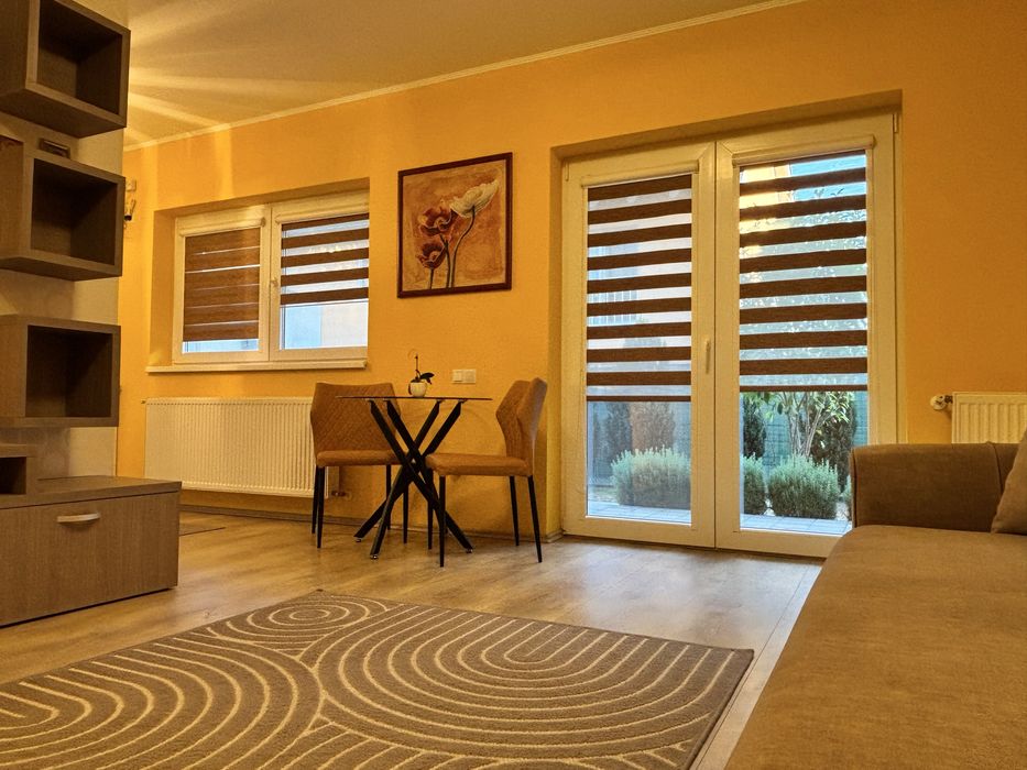 Apartament la vilă, cu 2 camere, curte și loc de parcare