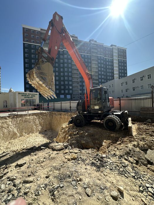 Аренда экскаватора колесный