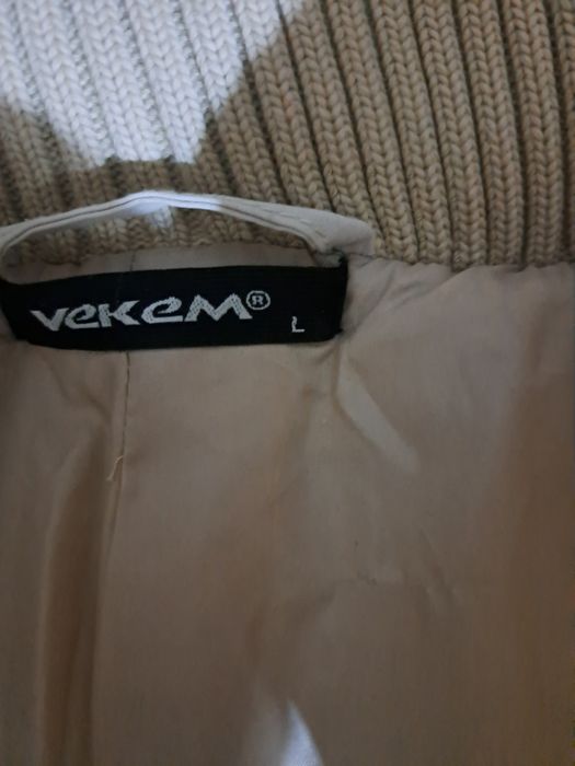 Женский пуховик.