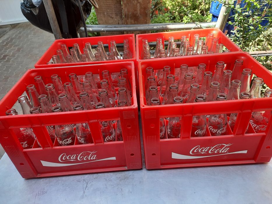 Кока-кола тара бор бутилкаси билан