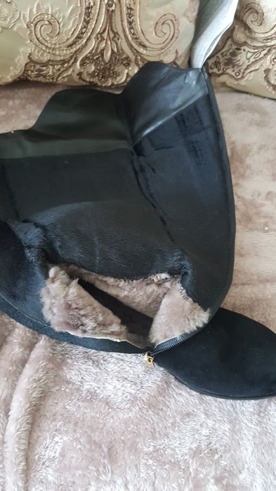 Продам новые зимние сапоги