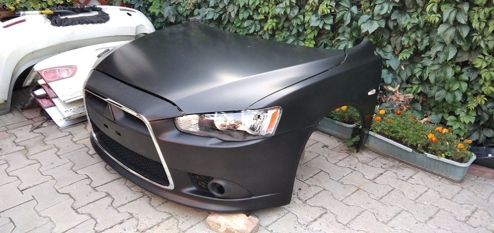 бампер передний лансер 10