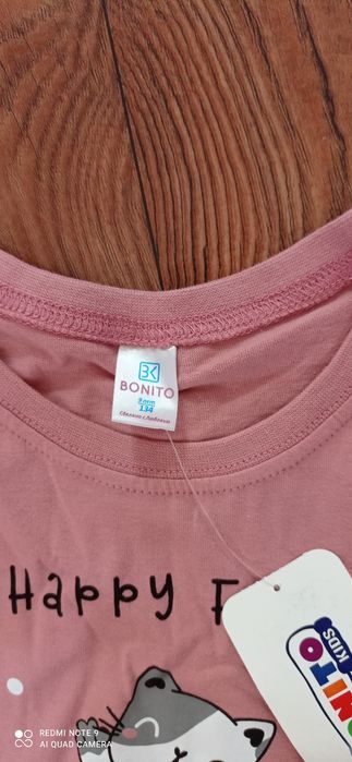 Новая футболка на рост 134