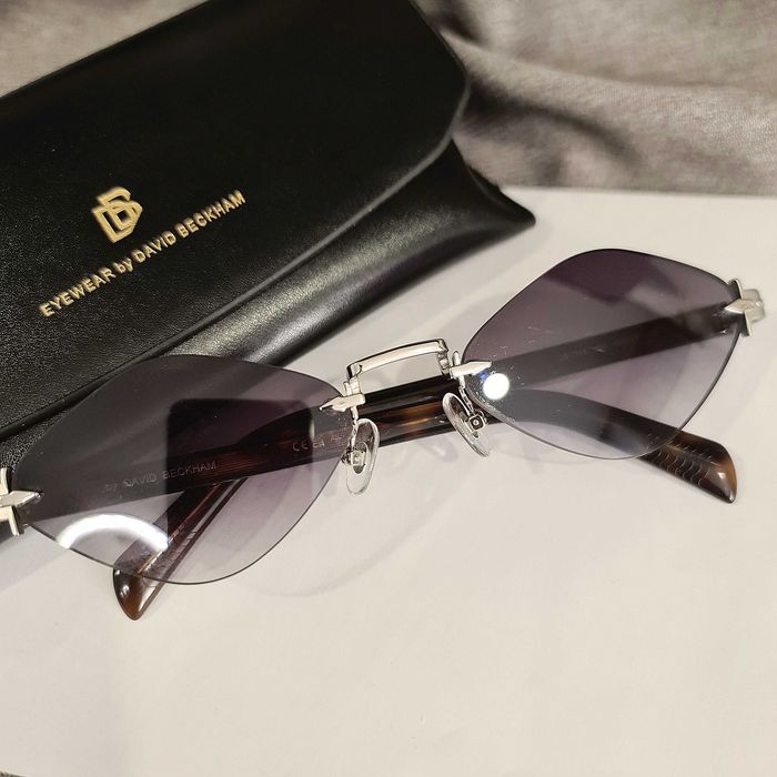 Солнцезащитные очки DB.