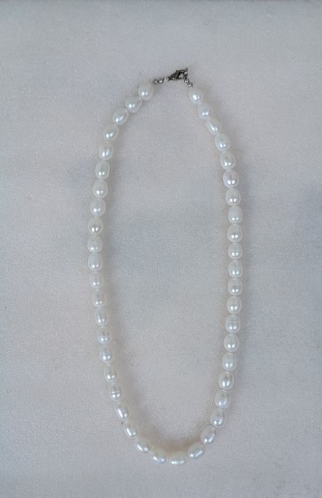 Новые бусы из жемчуга.