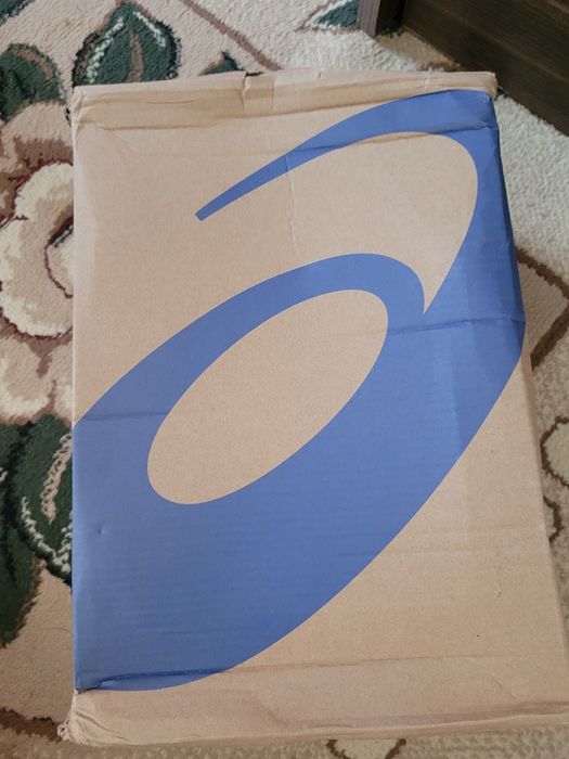 Беговые кроссовки Asics.