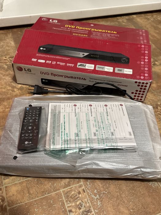 DVD проигрыватель LG DVX440 новый в упаковке с пультом