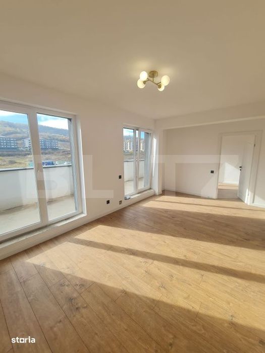 Apartament finisat, 52 mp utili, terasa 34 mp, zona Terra — fotografia 1