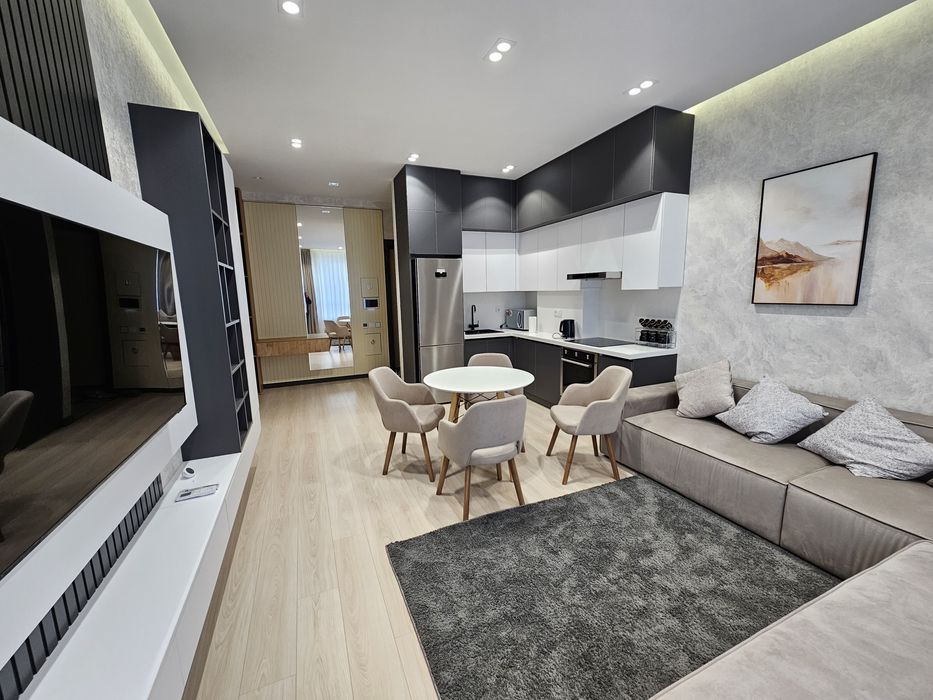 Современная квартира в NRG Oybek — мебель, техника, вид.