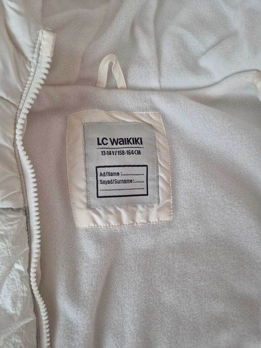 Теплая жилетка на девочку