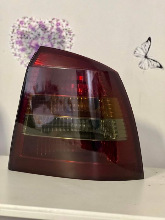 Stopuri/ Lampi Opel Astra G Hatchback cu folie fumurie