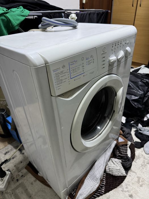 Стиралка жұмыс істеп тұр