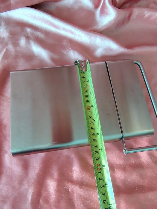 Tăietor din inox pentru brânzeturi