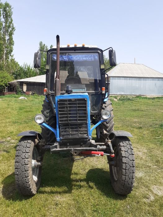 Трактор мтз 80 с плугом