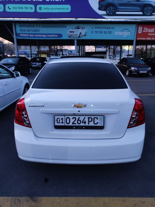 2023 Gentra Lasetti avtomat lyukli oq kraska toza