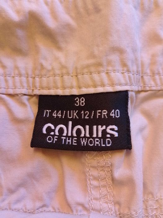 Къса бяла пола с джобчета