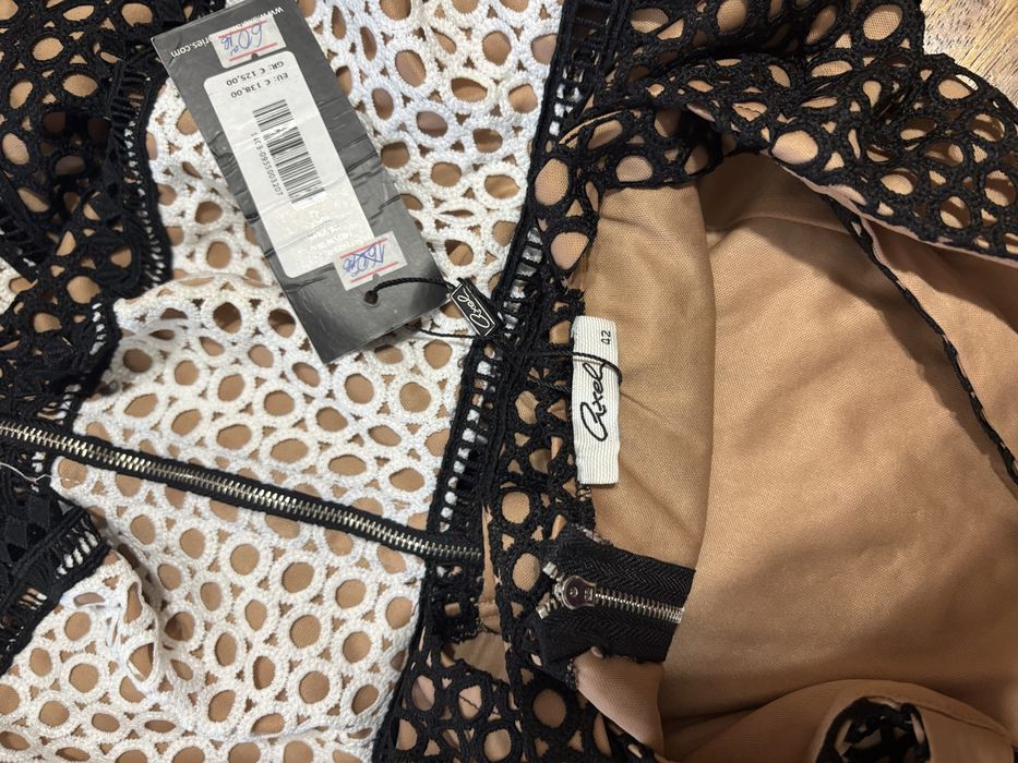 Рокля от Аксел