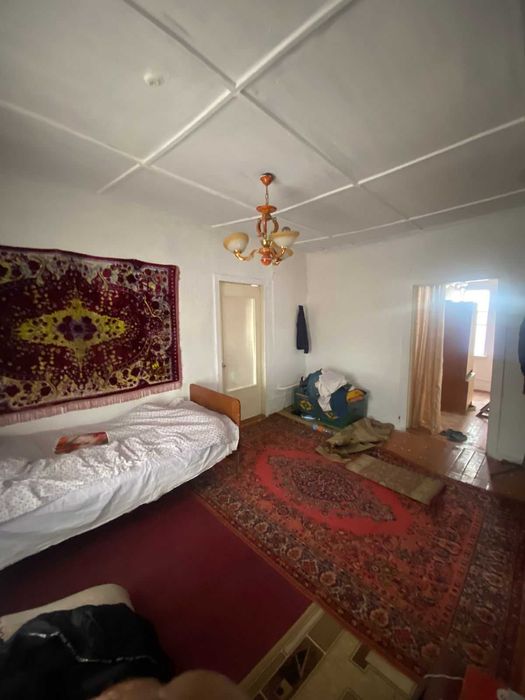 Дом, улица Калиева, Танат Империя