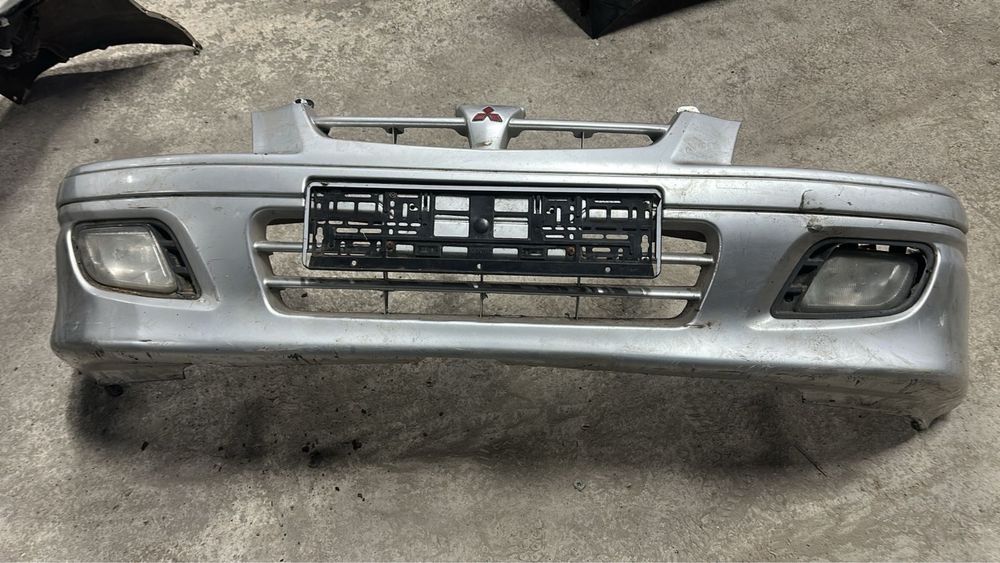 Передний Бампер Митсубиси Спейц Стар