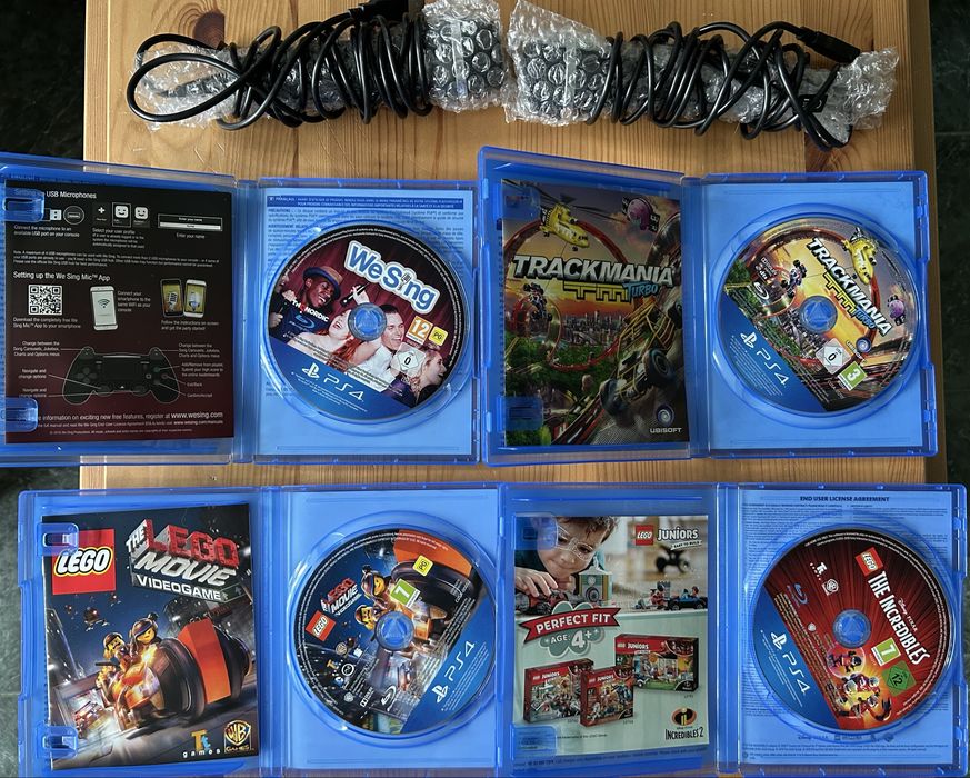 Pachet jocuri PS4: Trackmania Turbo, Lego Movie, Lego Incredibles, We Sing + Microfoane