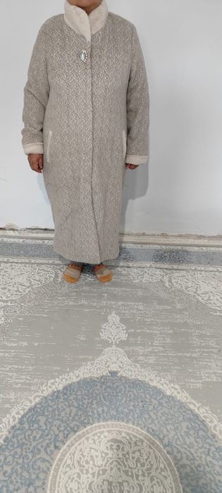 Одежды ,пальто,брюки,сумка.