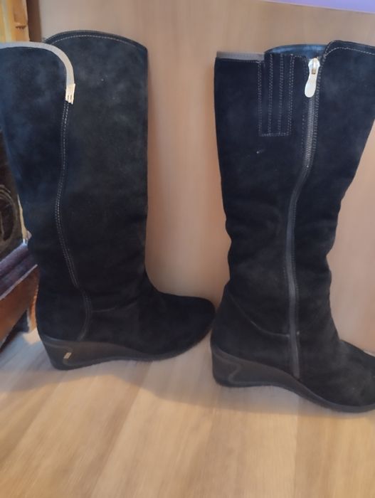 Продаю зимние сапоги