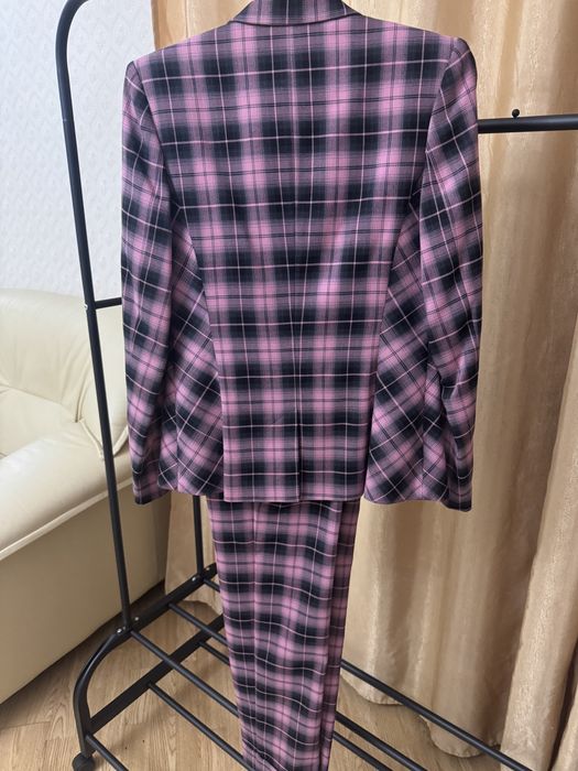 Брючные костюмы новые