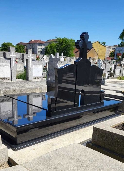 Servicii funerare-Executăm monumente funerare din granit, marmură si mozaic, cavouri și lucrări în cimitir.