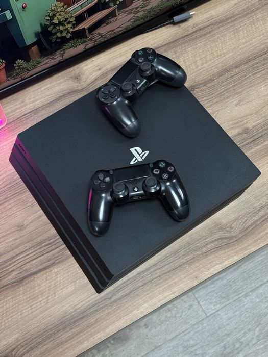 Sony PlayStation 4 Pro 1Tb, 2 геймпадa, 15 игр в подарок