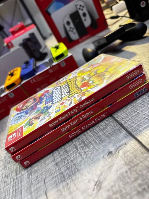 Nintendo Switch Oled - 3 jocuri + 4 perechi de joy-con-uri + accesorii