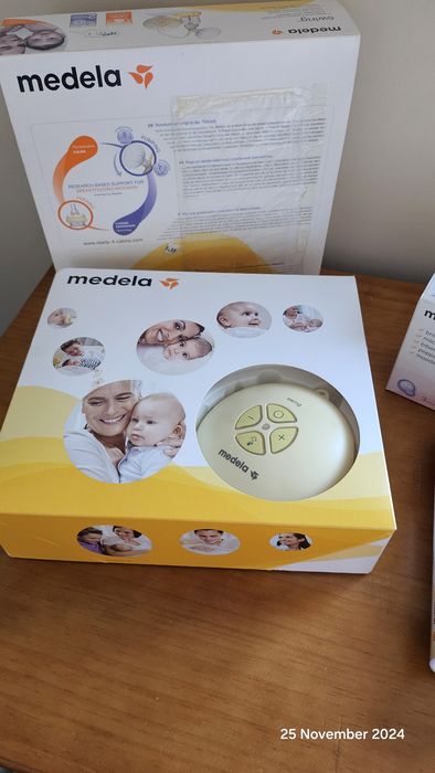Pompă electrică Medela + biberoane